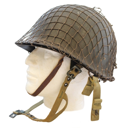WW2 U.S M1C Paratrooper helmet with liner and netting, minor marks to helmet, minor tears to netting, overall extremely fine. (½B)