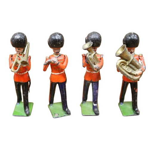 Britains. Collection of unboxed soldiers, generally good to very good with Royal Scots Greys Second Dragoons, Highlanders, Scots Guards, Royal Navy, Marching Band, Bagpipers etc. plus Howitzer and trucks. (B)