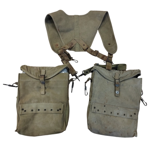 101 - U.S. Army medical bags with harness, general aging and wear, some stains, interior of one bag marked... 