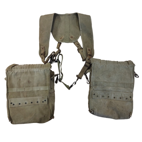 101 - U.S. Army medical bags with harness, general aging and wear, some stains, interior of one bag marked... 