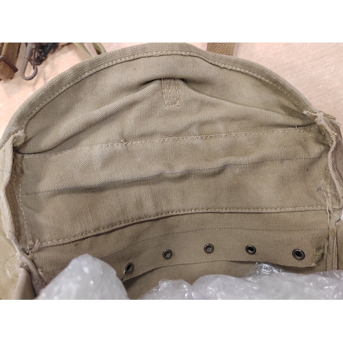101 - U.S. Army medical bags with harness, general aging and wear, some stains, interior of one bag marked... 