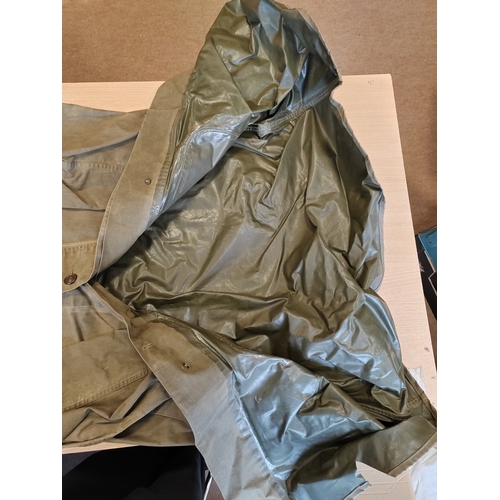 114 - WW2 U.S. Army olive green rubberised canvas raincoat, general aging and wear, some minor stains othe... 