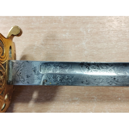 61 - 1827 Pattern Naval officers sword with leather scabbard by Wilkinson Sword, minor pitting and knicks... 