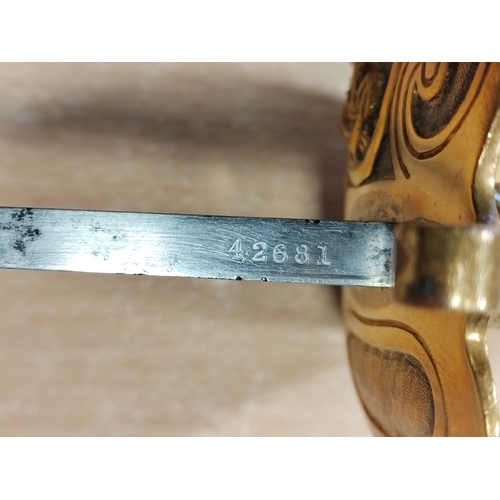61 - 1827 Pattern Naval officers sword with leather scabbard by Wilkinson Sword, minor pitting and knicks... 