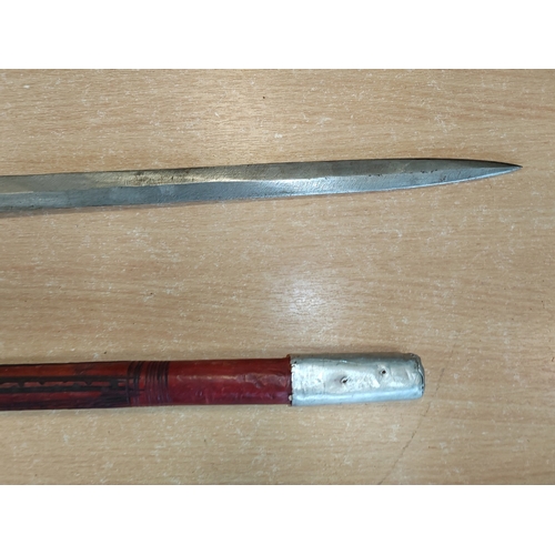 66 - Somali stick sword, dark red leather, crook style handle, about good very fine. BUYER MUST COLLECT.
