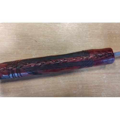 67 - Somali stick sword, dark red leather, crook style handle, sword is stiff in scabbard and difficult t... 