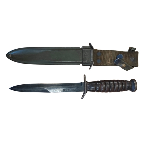 69 - U.S. M3 trench knife with M8 scabbard, blade marked U.S M3 Kinfolks,Inc., markings to pommel, scabba... 