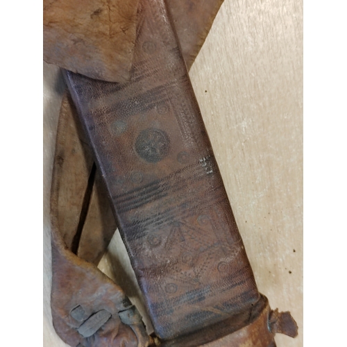 71 - Dominican Republic Kaskara sword with leather scabbard, 80% ornately etched blade with patterns and ... 