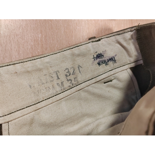82 - Range of WW2 uniforms with U.S. winter jumper, wool trousers and belt, officer shirt and jacket, mix... 