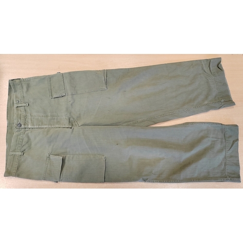 84 - U.S. range with Khaki Marine trousers, M1 Carbine ammo pouch with 2 magazines, Medic pouch with Carl... 