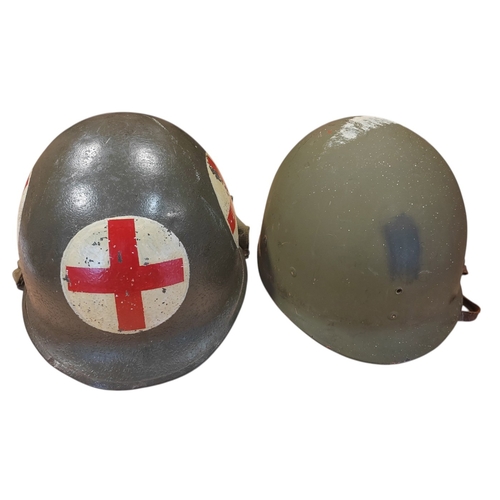 94 - WW2 U.S. Medic M1 helmet swivel bale and liner, M1 helmet is painted on all 4 sides with white circl... 