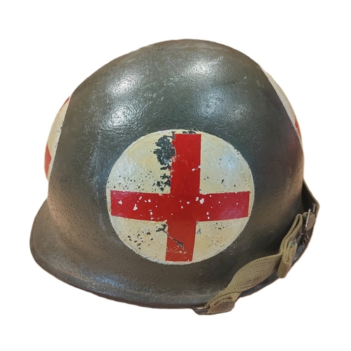 94 - WW2 U.S. Medic M1 helmet swivel bale and liner, M1 helmet is painted on all 4 sides with white circl... 