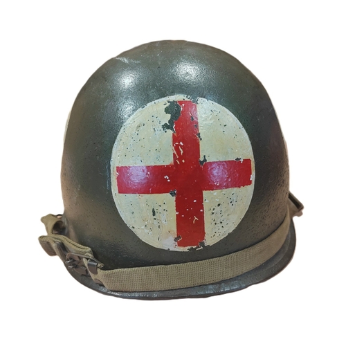 94 - WW2 U.S. Medic M1 helmet swivel bale and liner, M1 helmet is painted on all 4 sides with white circl... 