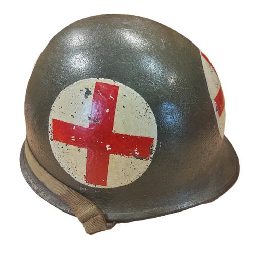 94 - WW2 U.S. Medic M1 helmet swivel bale and liner, M1 helmet is painted on all 4 sides with white circl... 