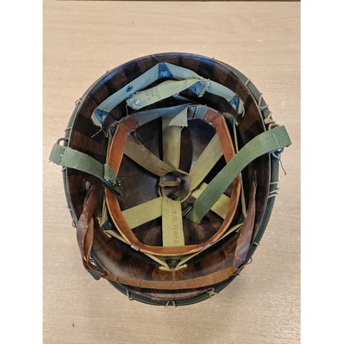 96 - U.S. M1 Helmet with swivel bale, netting and liner, inner material straps marked W-199-QM 39934 VOGT... 