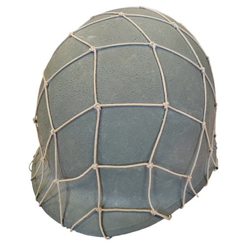 96 - U.S. M1 Helmet with swivel bale, netting and liner, inner material straps marked W-199-QM 39934 VOGT... 