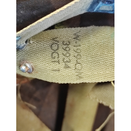 96 - U.S. M1 Helmet with swivel bale, netting and liner, inner material straps marked W-199-QM 39934 VOGT... 