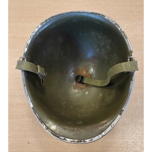98 - M1 Helmet and M.S.A liner, indentations to top of helmet, minor paint peeling, M.S.A heat stamp insi... 