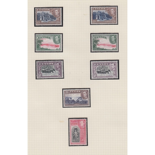 33 - STAMPS George VI mint and used in green springback album, good clean collection with many part sets