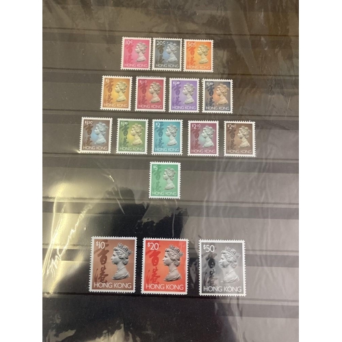 416 - STAMPS HONG KONG Box with various albums, stock pages etc. A mostly modern mint selection with many ... 