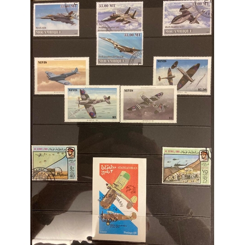 56 - STAMPS : AIRCRAFT on stamps, collection in four ring binder 100's of stamps, mint and used, includin... 