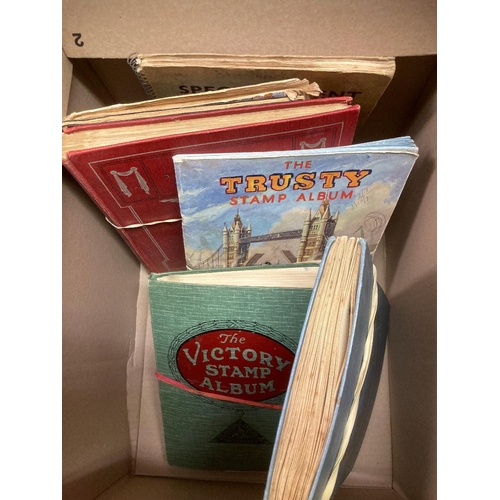 25 - Box with seven old world albums, better than the usual junior type albums, many better stamps spotte... 