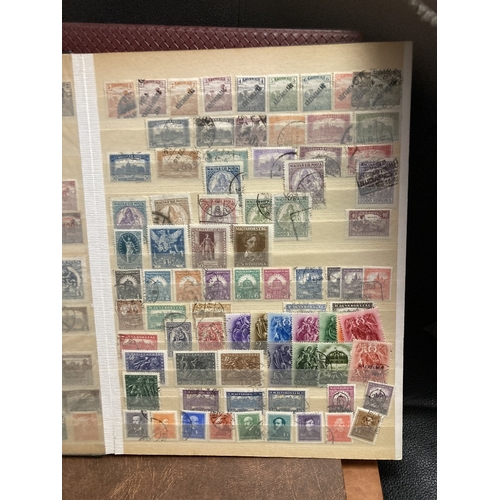 10 - All World accumulation of stamps in four stockbooks including some early GB