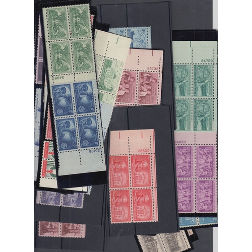 315 - Stamps USA, mint issues in blocks of four 1950's