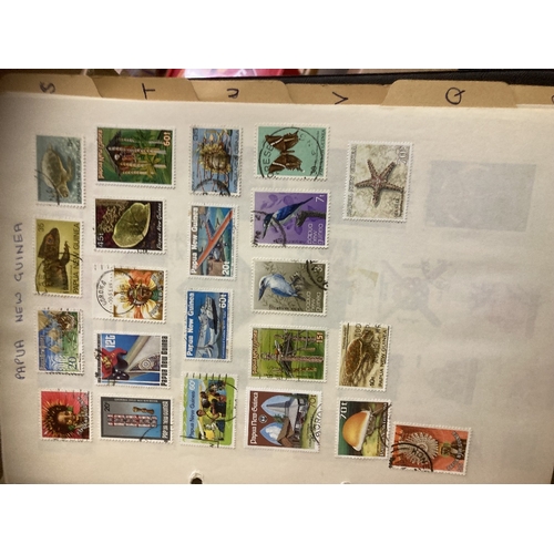 27 - Large collection of stamps including year books etc (heavy lot in 2 boxes), buyer to collect