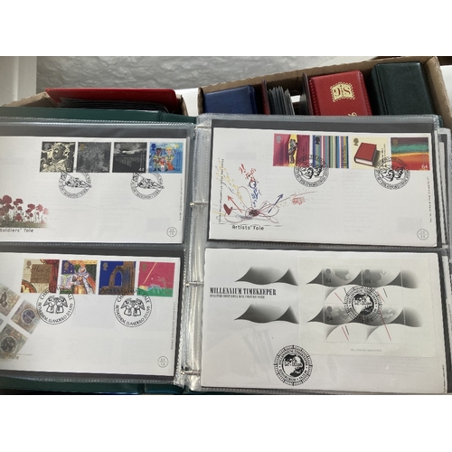 76 - STAMPS : Two boxes of First Day Covers and stamp albums GB and Channel Islands