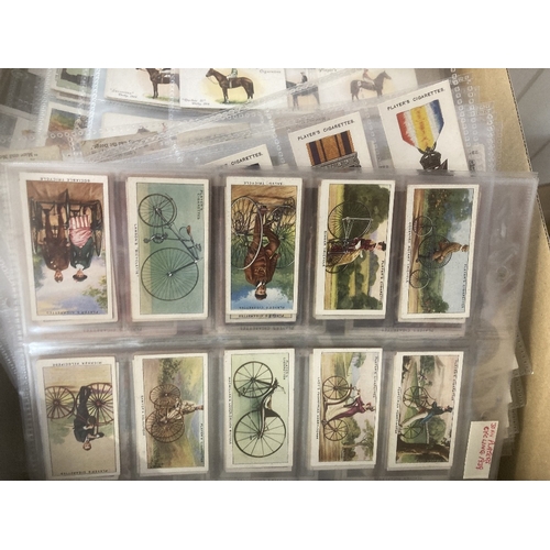 162 - CIGARETTE CARDS : Box with approx 4500 cigarette cards in bundles and in protective pages. Stated to... 