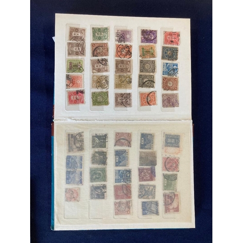 126 - STAMPS : Three small stockbooks of old World stamps, including some China