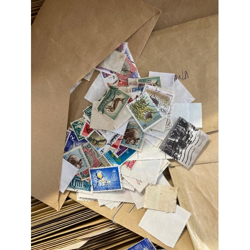 73 - STAMPS : Box of loose World stamps sorted into envelopes (1000's) early to mid QEI period ,