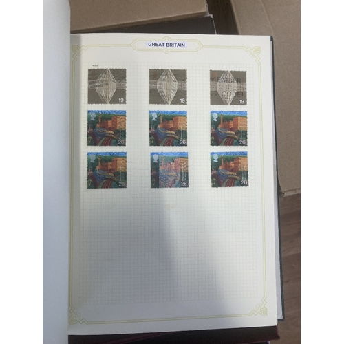 147 - CHARITY STAMPS : Eleven albums, with World stamps mainly boxed spring-back albums, being sold on beh... 