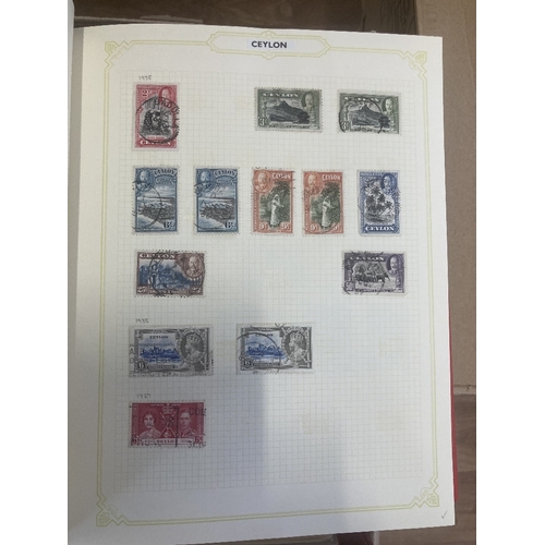 147 - CHARITY STAMPS : Eleven albums, with World stamps mainly boxed spring-back albums, being sold on beh... 