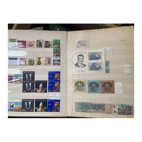 49 - STAMPS : MIDDLE EAST, box with mint & used in six stockbooks. Includes Iran, Iraq, Jordan, Saudi, Ku... 