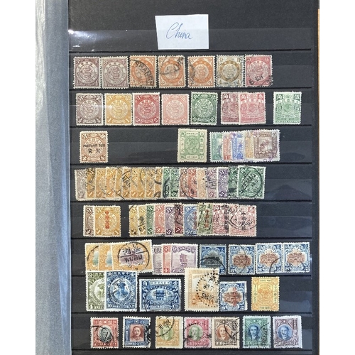 32 - STAMPS : Stockbook with mint and used Foreign, lots of better sets and stamps noted . China includin... 