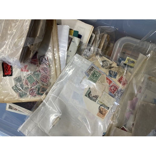 109 - STAMPS : Large plastic tub of loose stamps, covers, albums, album pages etc