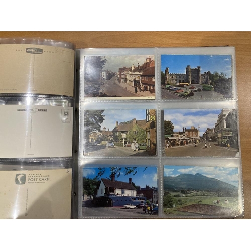 27 - Large album of mainly tourist type postcards towns A-D (approx 250 cards) heavy album