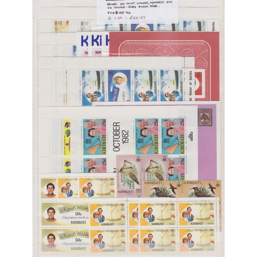 23 - STAMPS : KIRIBATI, a selection of U/M QEII issues on four double-sided stock pages. Many sets and mi... 