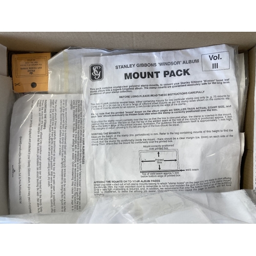 102 - Box of various Hawid stamp mounts, clear and black with a good range of sizes. A mixture of opened a... 