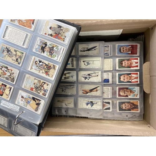 77 - CIGARETTE CARDS : Box with 123 sets/part sets all neatly displayed in cigarette card pages. Includes... 