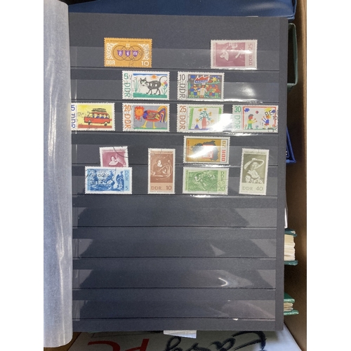 386 - STAMPS GERMANY Large box of various albums and pages of East and West Germany