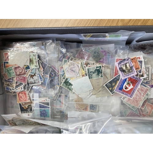 59 - STAMPS CHARITY : Box of mixed off paper World stamps (1000's) (being sold on behalf of the Friends o... 