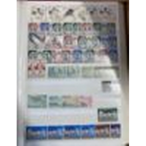 52 - CHARITY STAMPS Three stock books of MINT stamps , all World , (being sold on behalf of the Friends o... 