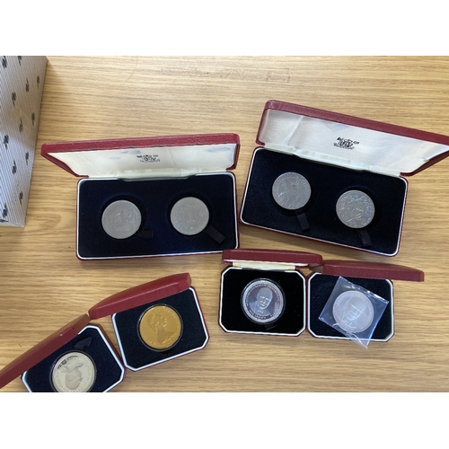 606 - COINS Accumulation of boxed and cased Crowns, some silver noted