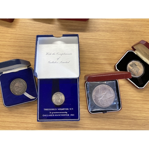 606 - COINS Accumulation of boxed and cased Crowns, some silver noted