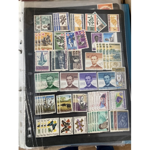 100 - STAMPS Mixed box with folders, stock pages and a stock book, Latvia, Germany, Russia, Africa etc