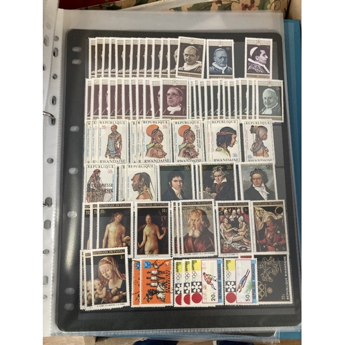 100 - STAMPS Mixed box with folders, stock pages and a stock book, Latvia, Germany, Russia, Africa etc