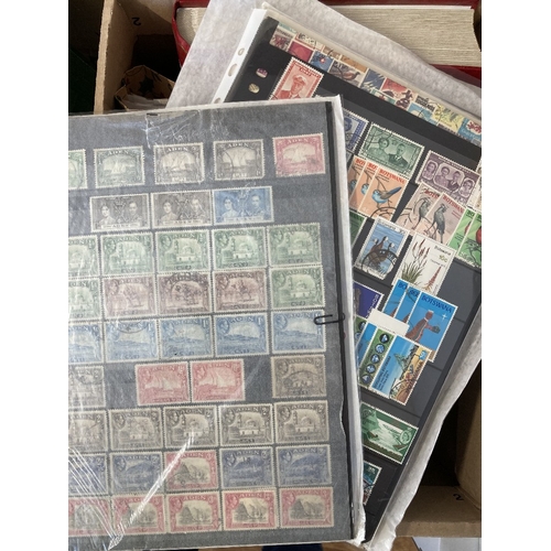 100 - STAMPS Mixed box with folders, stock pages and a stock book, Latvia, Germany, Russia, Africa etc